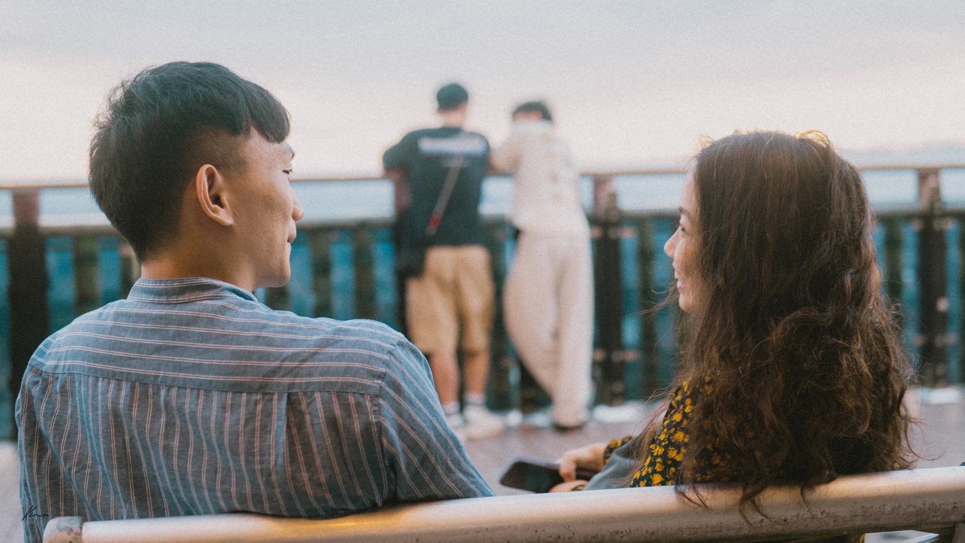 Cinematic couple photoshoot overlooking scenic mountain vista in Vietnam by Kevin Duong
