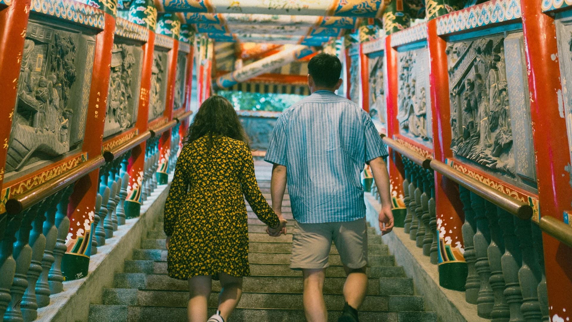 Travel walk across mountain bridge surrounded by greenery
