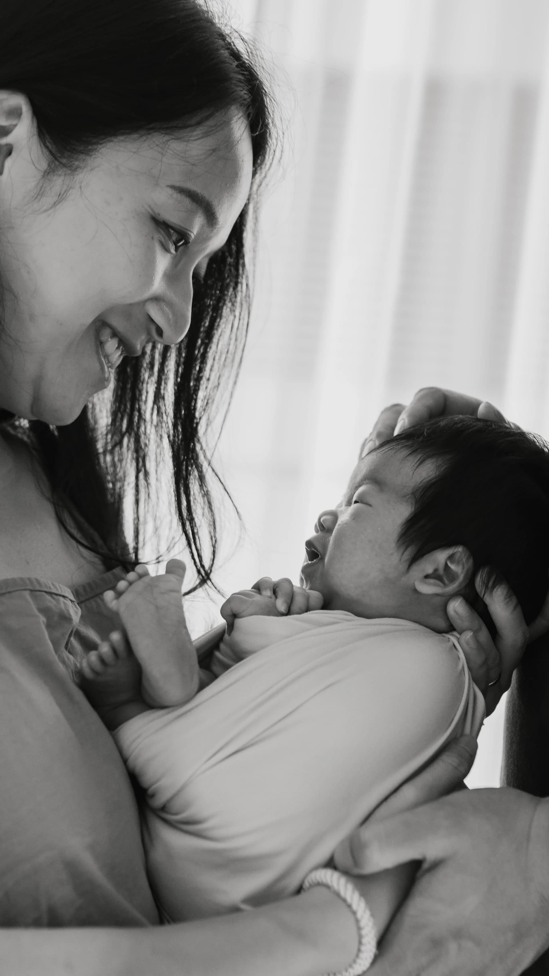 Newborn and candid family lifestyle photography in Ho Chi Minh City by Kevin Duong